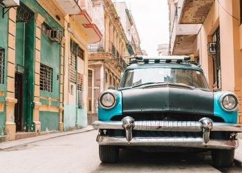 HAVANA, CUBA - APRIL 14, 2017: Classic vintage car in Old Havana, Cuba. The most popular transportation for tourists are used as taxis.